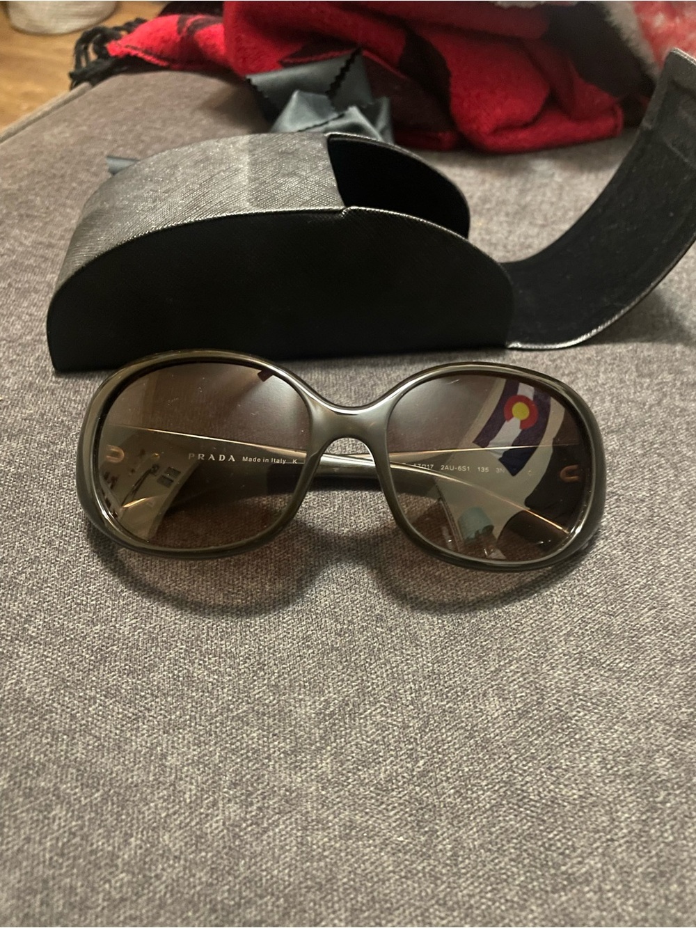 Prada Black Sunglasses with Gold Logo Accents - Picture 2 of 2